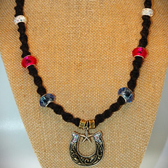 Gold-Toned Antiqued Rhinestone Horseshoe on a Handmade Black 20 1/4" Hemp Chain - Picture 1 of 6